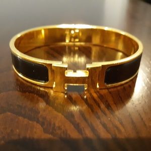 Hermes black and gold clik clak enamel bracelet